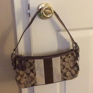 - Coach signature purse